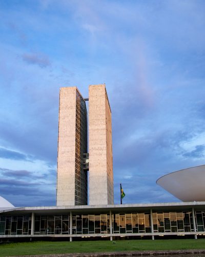 view of building of the federal senate and chamber of Deputies with blue sky and clouds on background